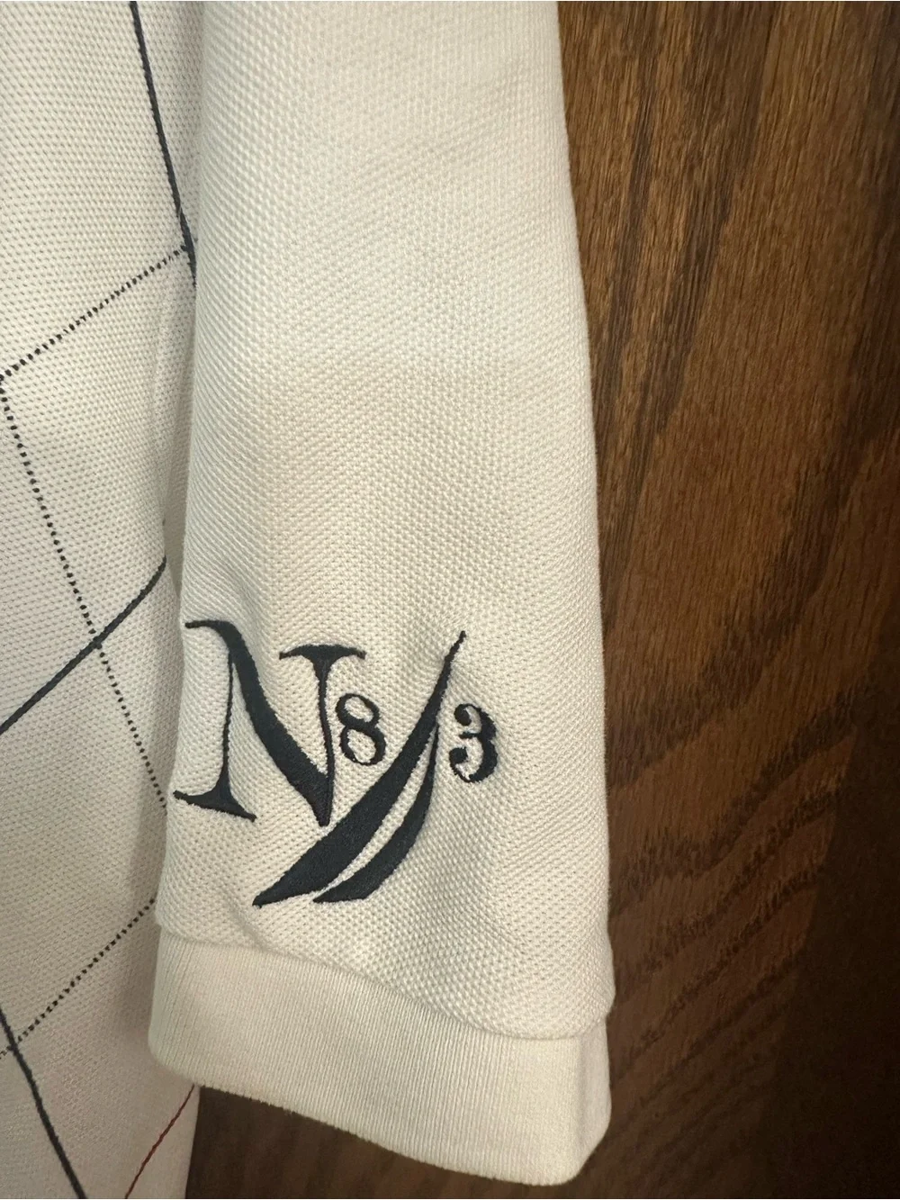 Nautica Men’s White Polo with Navy Collar and Red/Navy Argyle Lines